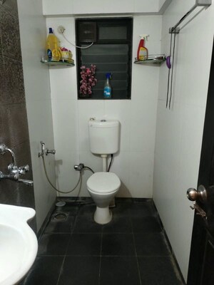 Bathroom in 1 BHK Apartment at Lalani Residency, Kavesar – for Sale