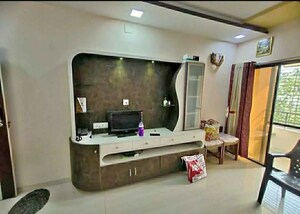 Living Room in 1 BHK Apartment at SPE Eksar Heights, Borivali West – for Rent