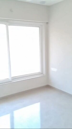 Room in 2 BHK Apartment at Azad Nagar Sangam CHS, Andheri West – for Rent