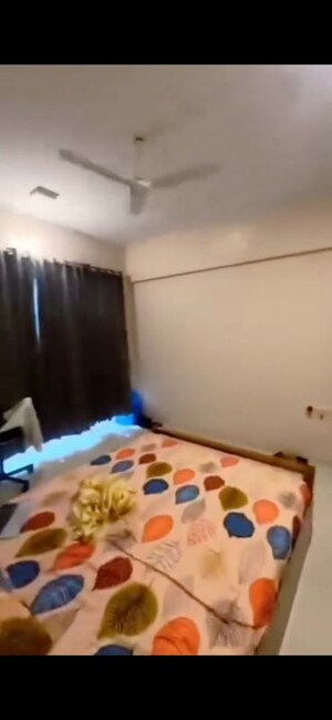 Bedroom in 2 BHK Apartment at Dev Leo Tower, Oshiwara – for Rent