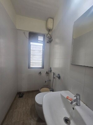 Bathroom in 1 BHK Apartment at Vasudev Sky High, Mira Road – for Rent