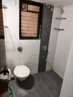Bathroom in 2.5 BHK Apartment at Shree Satya Shankar Residency, Manpada – for Rent