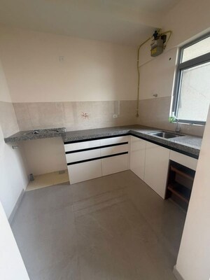 Kitchen in 2 BHK Apartment at Piramal Vaikunth A Class Homes, Balkum Pada – for Rent