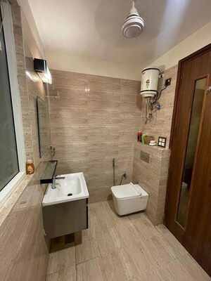 Bathroom in 2 BHK Apartment at Emaar The Palm Drive-Palm Studios, Sector 66 – for Rent