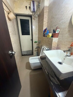 Bathroom in 2 BHK Apartment at STG Marigold Siddheshwar Garden, Dhokali – for Rent