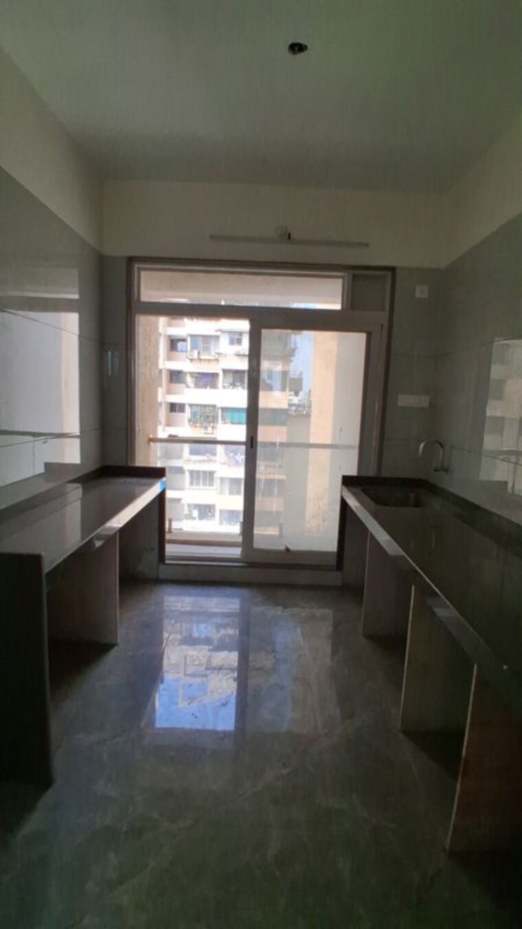 Kitchen, delta-luxuria 2 Bedroom 859 Sq.Ft. Apartment In Airoli Sector 19 Navi Mumbai 10770919