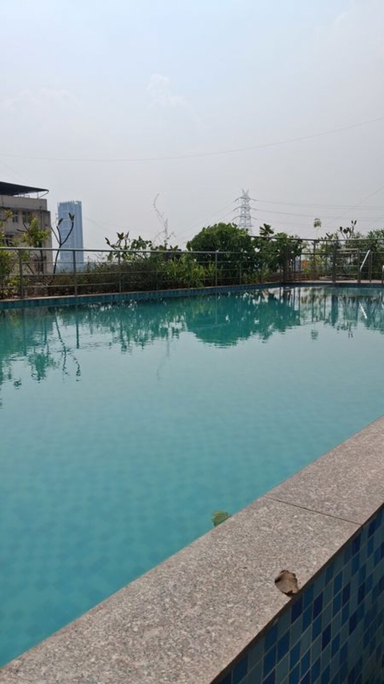 Swimming Pool, delta-luxuria 2 Bedroom 859 Sq.Ft. Apartment In Airoli Sector 19 Navi Mumbai 10770919