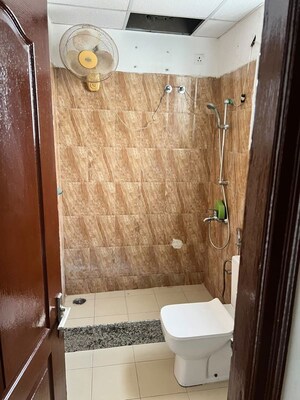 Bathroom in 3 BHK Apartment at Dhakoli – for Rent