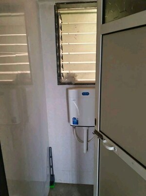 Bathroom in 2 BHK Apartment at Aakash Ganga CHS, Nalasopara West – for Sale
