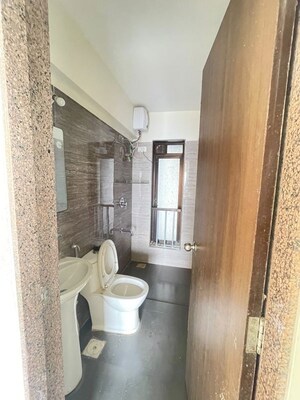Bathroom in 2 BHK Apartment at Acme Oasis, Kandivali East – for Rent