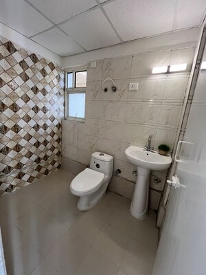 Bathroom in 2 BHK Apartment at Eureka Diya Green City, Raj Nagar Extension – for Sale