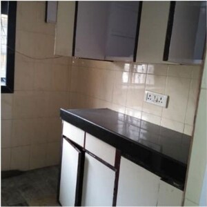 Kitchen in 2.5 BHK Apartment at Ashirwad Tower, Andheri West – for Rent