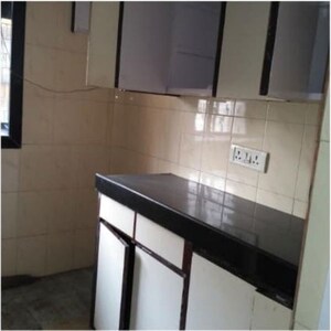 Kitchen in 2.5 BHK Apartment at Ashirwad Tower, Andheri West – for Rent