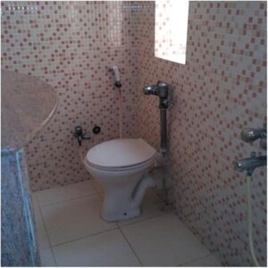 Bathroom in 2.5 BHK Apartment at Ashirwad Tower, Andheri West – for Rent