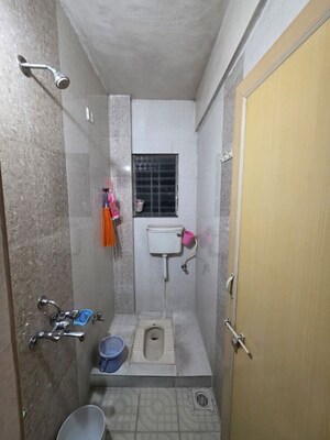 Bathroom in 2 BHK Apartment at Pimple Gurav – for Rent