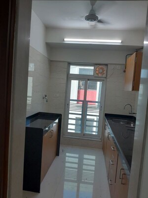 Building Lobby in 2 BHK Apartment at Romell Allure, Borivali East – for Rent