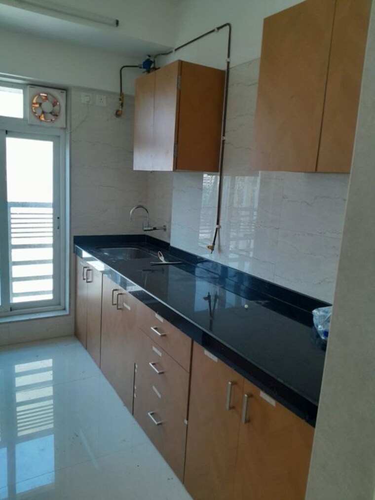 Kitchen, romell-allure 2 Bedroom 606 Sq.Ft. Apartment In Borivali East Mumbai 10771333