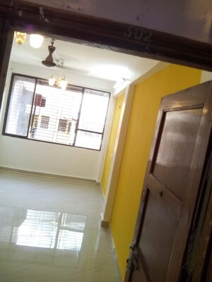 Living Room in 1 BHK Apartment at Icon Plaza, Dombivli East – for Rent