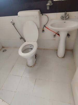Bathroom in 2 BHK Apartment at Raj Nagar – for Sale