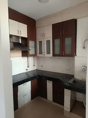 Kitchen in 2 BHK Apartment at Raj Nagar – for Sale
