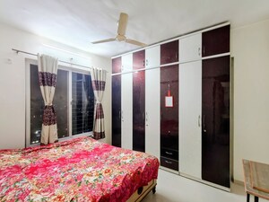 Bedroom in 2 BHK Apartment at Lakshmi Ivana, Wakad – for Rent
