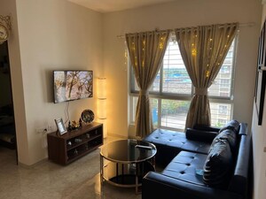 Living Room in 2 BHK Apartment at Lodha Amara, Kolshet Road – for Sale