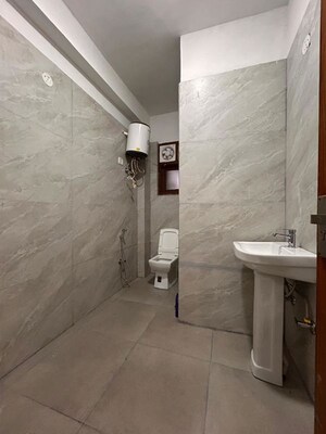 Bathroom in 2 BHK Builder Floor at Chattarpur – for Rent