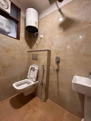 Bathroom in 2 BHK Builder Floor at Chattarpur – for Rent