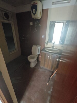 Bathroom in 3 BHK Apartment at Mahagun Moderne, Sector 78 – for Sale