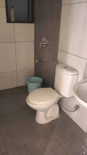 Bathroom in 3 BHK Apartment at Goel Ganga Millennia, Undri – for Rent