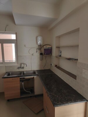 Kitchen in 5 BHK Apartment at ATS Golf Meadows, Central Derabassi – for Rent