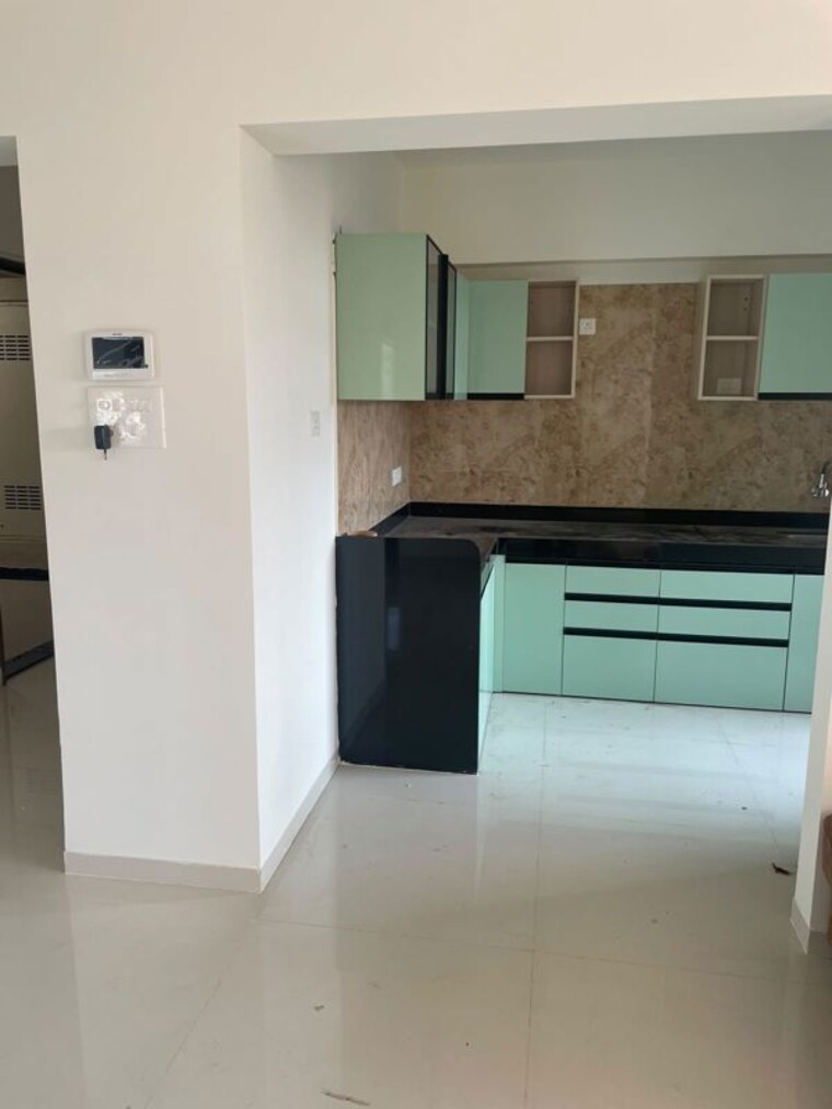 Kitchen, pristine-ilife 3 Bedroom 1043 Sq.Ft. Apartment In Mundhwa Pune 10771849
