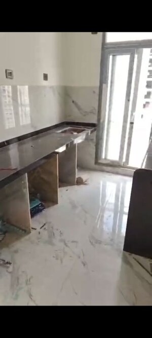 Kitchen in 2 BHK Apartment at Ruparel Sky Green, Kandivali West – for Rent