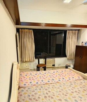 Bedroom in 3 BHK Apartment at Juhu – for Rent