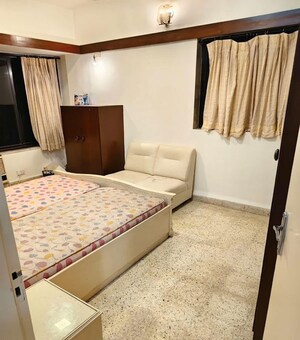 Bedroom in 3 BHK Apartment at Juhu – for Rent