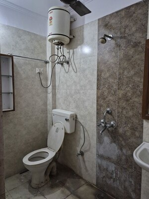 Bathroom in 2 BHK Builder Floor at Mehrauli – for Rent