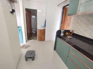 Kitchen in 2 BHK Apartment at Mukta Residency, Shilphata – for Rent
