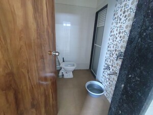 Bathroom in 2 BHK Apartment at Mukta Residency, Shilphata – for Rent