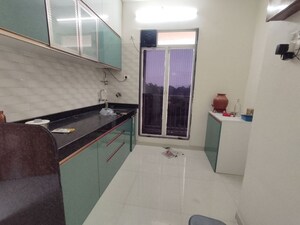 Kitchen in 2 BHK Apartment at Mukta Residency, Shilphata – for Rent