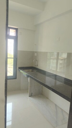 Kitchen in 1 BHK Apartment at RIPL Aikya Roots, Vikhroli West – for Rent