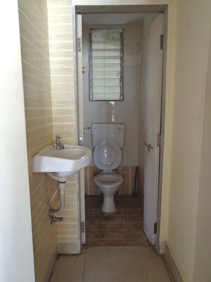 Bathroom in 1 BHK Apartment at Twins Hallmark, Kopar Khairane – for Rent
