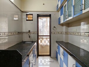 Kitchen in 2 BHK Apartment at Arihant Soni Sarovar Apartment, Borivali West – for Rent