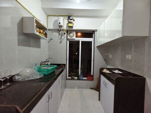 Kitchen in 1 BHK Apartment at The Green Sai Hill CHS, Borivali West – for Rent