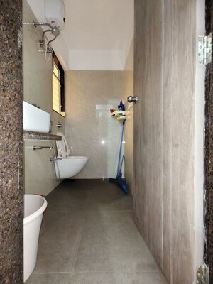 Bathroom in 1 BHK Apartment at The Green Sai Hill CHS, Borivali West – for Rent