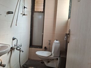 Bathroom in 3 BHK Apartment at Ajmera Heights, Kalyan West – for Rent