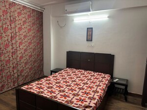 Bedroom in 3 BHK Apartment at Tulsiani Urban Woods, Sushant Golf City – for Rent