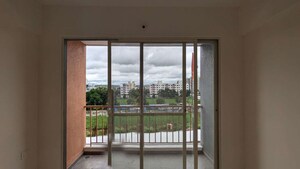 Room in 2 BHK Apartment at Vision Rhythm, Dudulgaon – for Rent