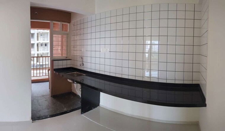 Kitchen, vision-rhythm 2 Bedroom 673 Sq.Ft. Apartment In Dudulgaon Pune 10772131
