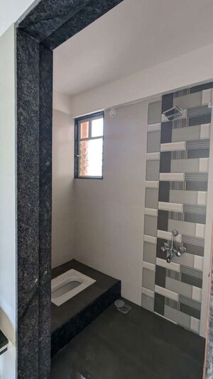 Bathroom in 2 BHK Apartment at Vision Rhythm, Dudulgaon – for Rent
