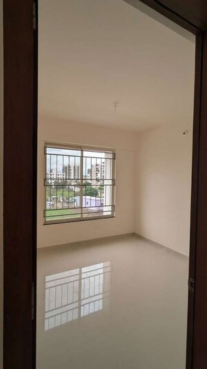 Room in 2 BHK Apartment at Vision Rhythm, Dudulgaon – for Rent